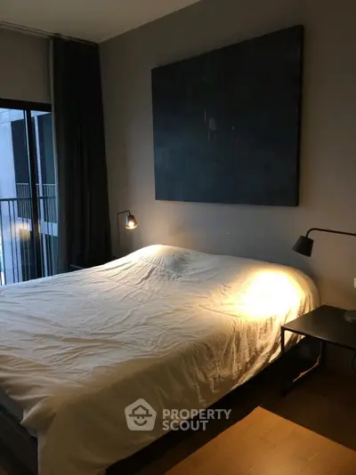 Modern bedroom with cozy lighting and minimalist decor