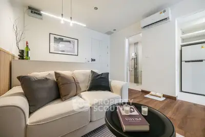 Modern living room with cozy sofa and stylish decor