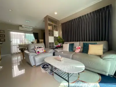 Spacious modern living room with elegant decor and ample natural light