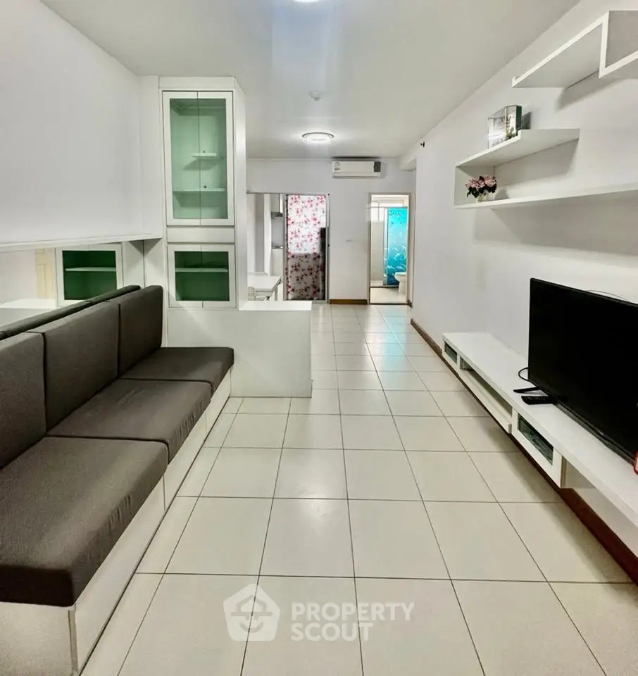 Modern living room with sleek furniture and open layout, perfect for contemporary living.