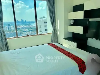 Spacious bedroom with stunning city view and modern furnishings
