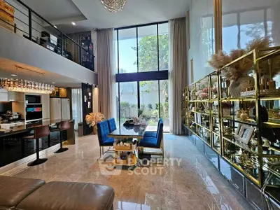 Luxurious modern living room with high ceiling and elegant decor