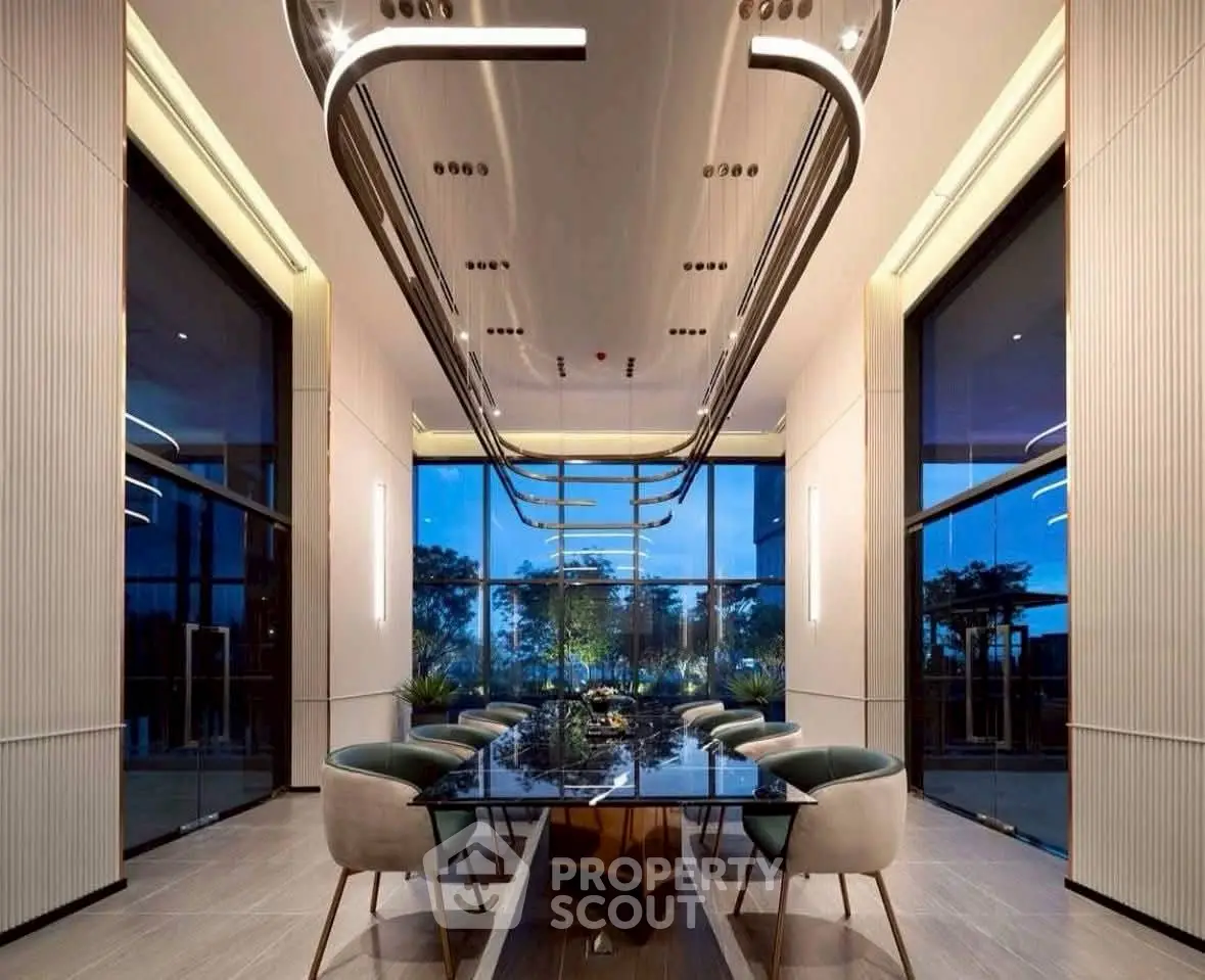 Luxurious modern dining room with elegant lighting and panoramic window views.