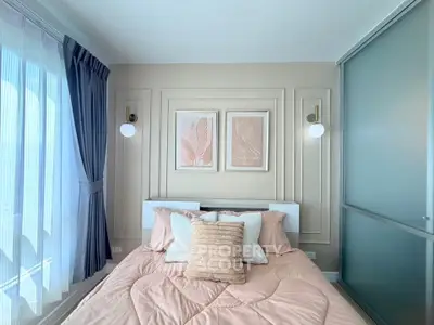 Chic and cozy bedroom with elegant decor and soft lighting, perfect for relaxation.