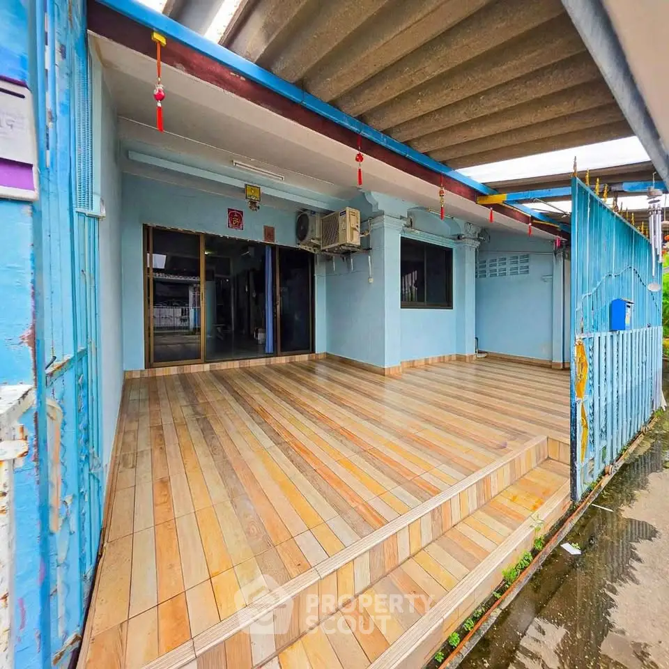 Spacious open-air entrance with tiled flooring and modern design