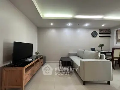 Modern living room with sleek furniture and ambient lighting