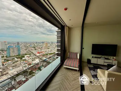 Stunning high-rise apartment with panoramic city view and modern interior design.