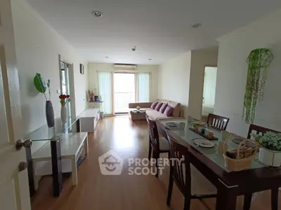 Spacious living room with dining area and modern decor