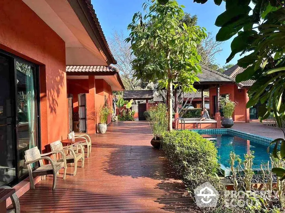 Stunning tropical villa with lush garden and private pool, perfect for luxury living.