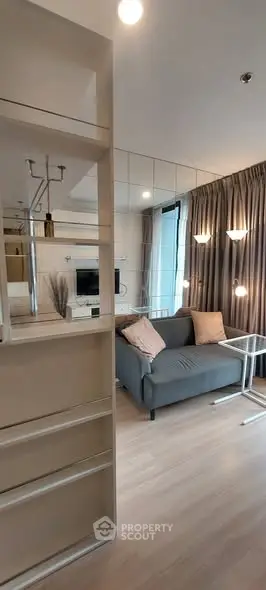 Modern living room with cozy sofa and stylish decor