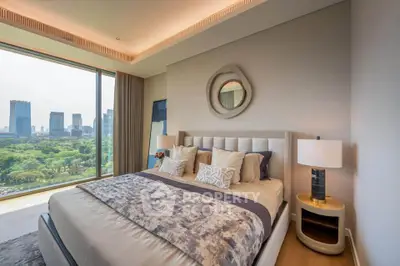 Luxurious bedroom with stunning city view and elegant decor