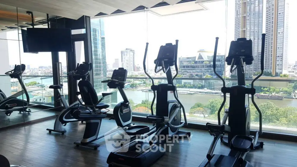 Modern gym with city view and state-of-the-art fitness equipment