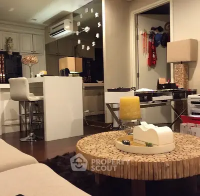 Stylish modern living room with open kitchen and chic decor