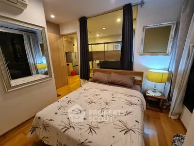 Cozy modern bedroom with wooden flooring and stylish decor