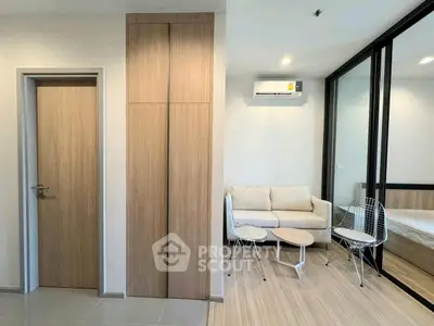 Modern living room with cozy seating and sleek design