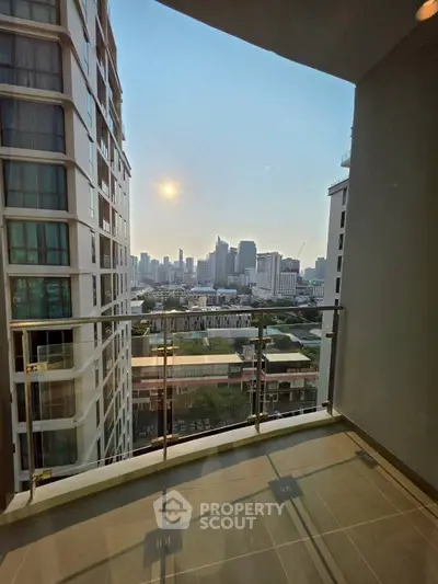 Stunning city view from modern balcony in high-rise apartment