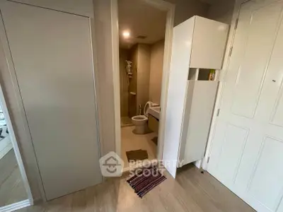Modern bathroom with sleek design and compact layout in a contemporary apartment.