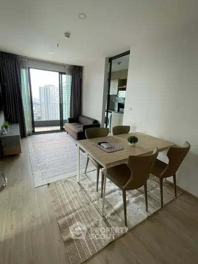 Modern living room with dining area and city view in high-rise apartment