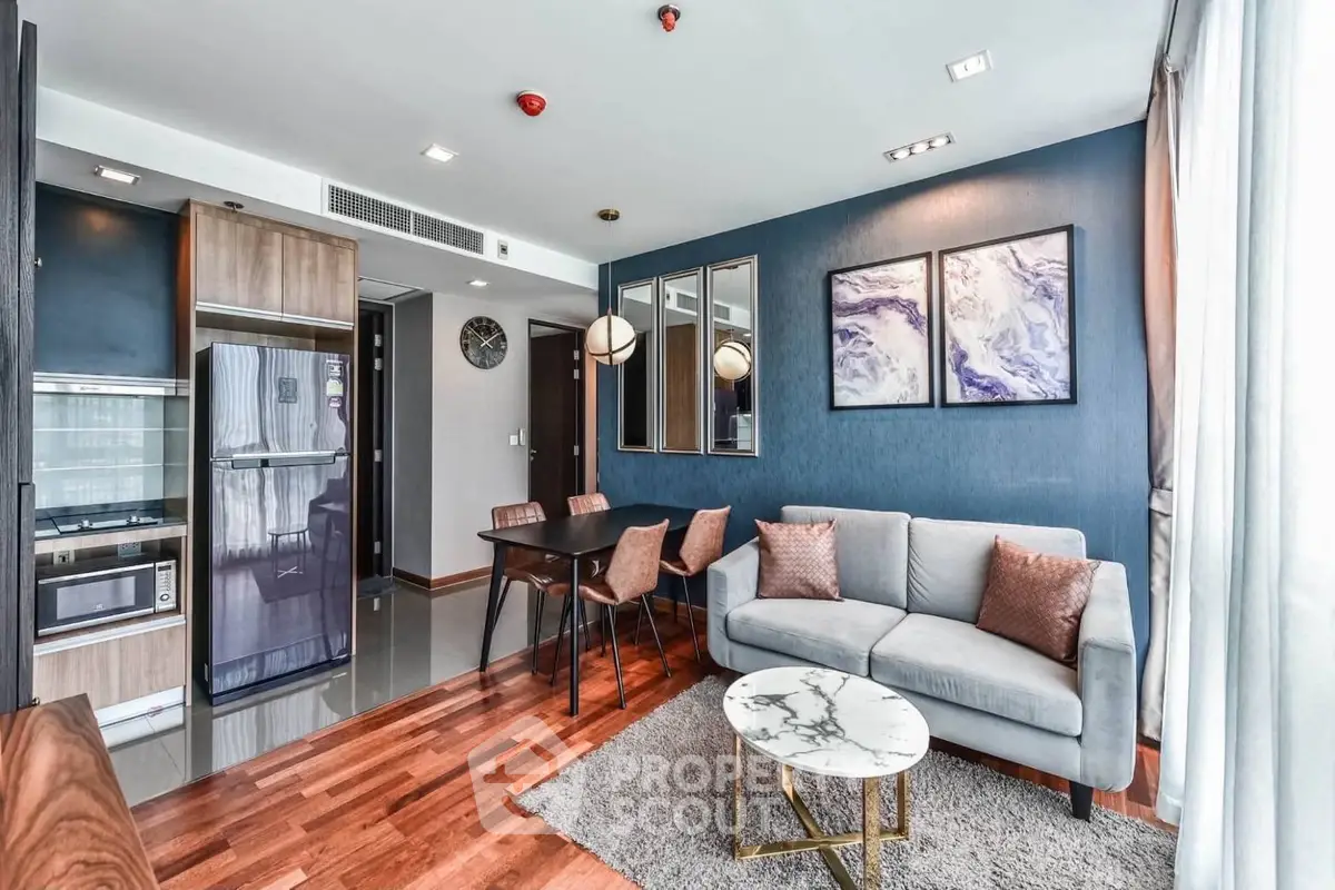 Modern living room with stylish decor and open kitchen layout