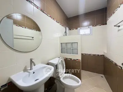 Modern bathroom with sleek fixtures and stylish tile design