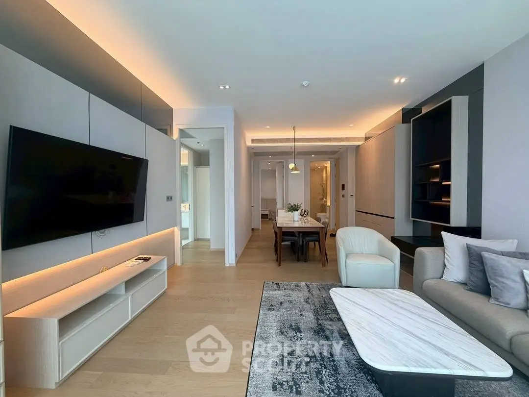 Modern living room with sleek design, open layout, and stylish furniture in a contemporary apartment.