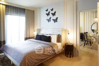 Elegant bedroom with stylish decor and natural light, perfect for modern living.