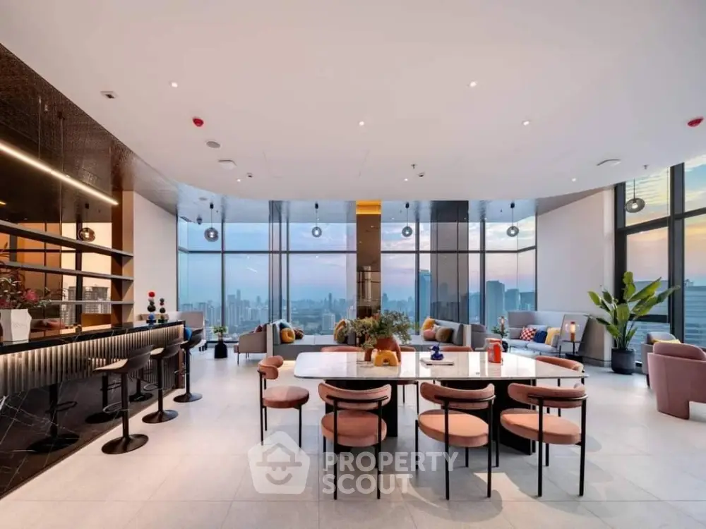 Luxurious high-rise apartment living room with panoramic city views, modern furniture, and elegant interior design.