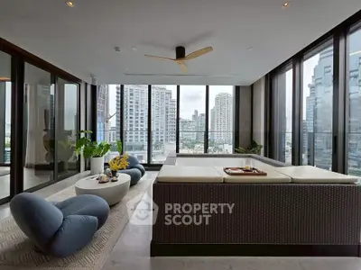 Luxurious modern living room with panoramic city view and stylish furniture.