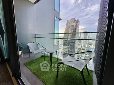 Stunning city view from modern balcony with stylish seating area