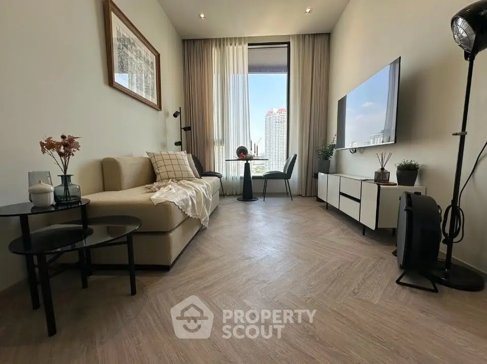 Modern living room with stylish decor and city view, featuring a cozy sofa and wall-mounted TV.