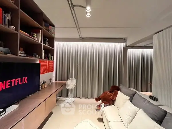 Cozy living room with modern decor and entertainment setup