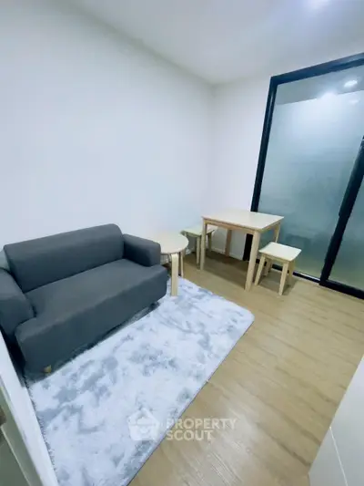 Cozy living room with modern furniture and wooden flooring