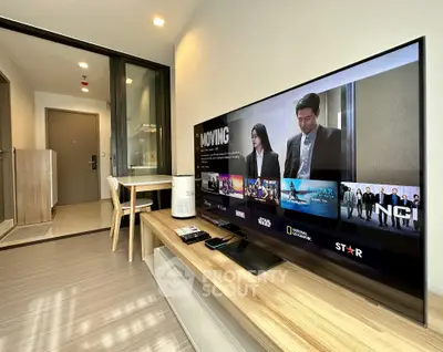 Modern living room with sleek TV setup and stylish decor