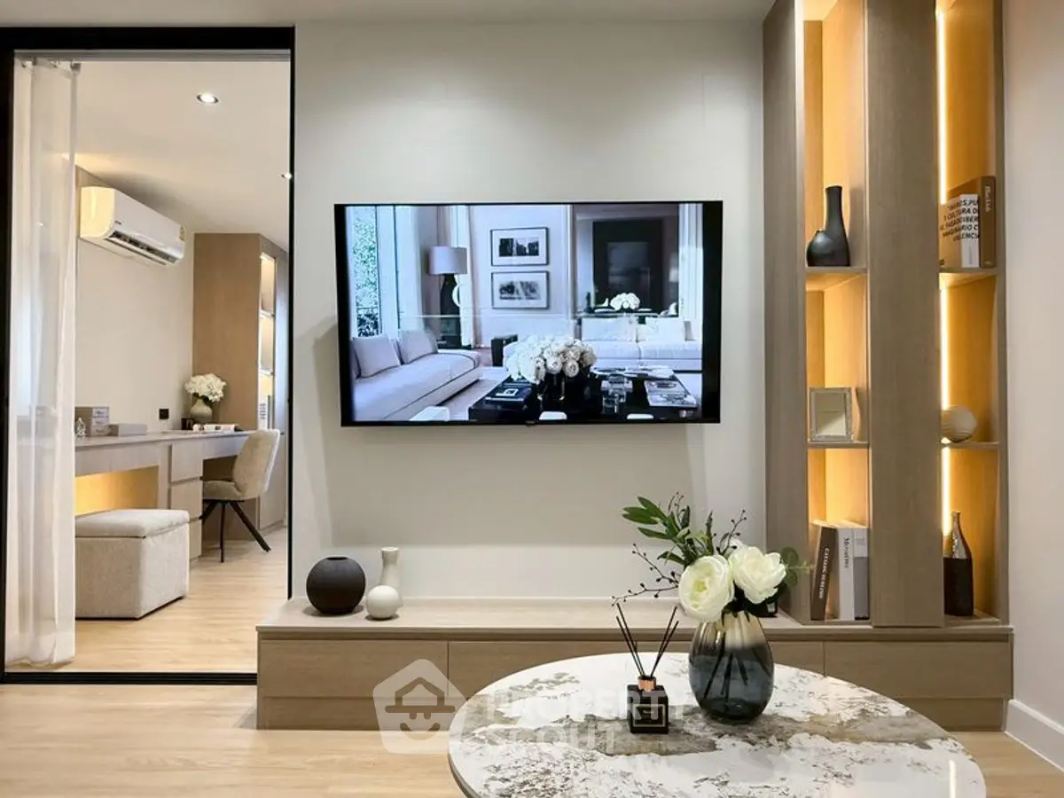 Modern living room with elegant decor and wall-mounted TV