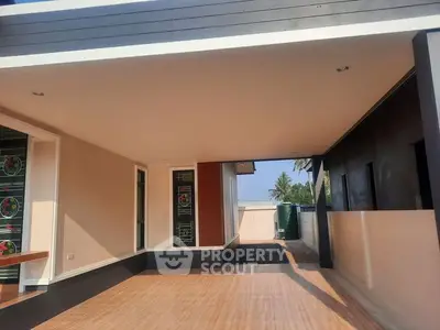 Modern covered parking area with stylish design and ample space.