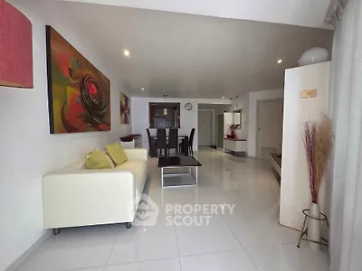 Spacious modern living room with elegant decor and open layout, perfect for entertaining.