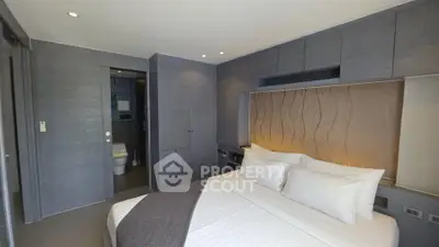 Luxurious modern bedroom with ensuite bathroom and elegant decor