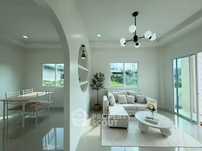 Modern living room with elegant white decor and natural light