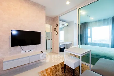 Modern living room with TV and view into bedroom, stylish decor