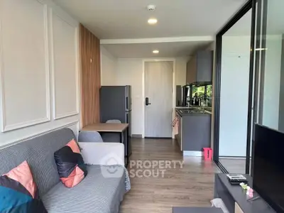 Modern living room with open kitchen in stylish apartment