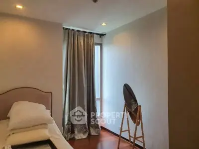 Cozy bedroom with elegant curtains and natural light