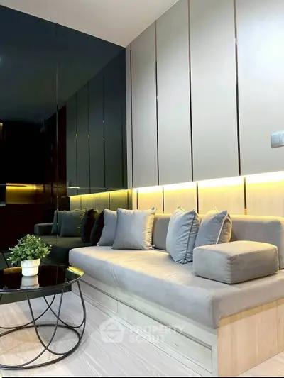 Modern living room with sleek design and cozy seating area