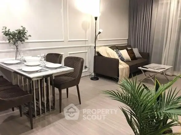 Stylish modern living room with elegant dining area and cozy sofa, perfect for urban living.
