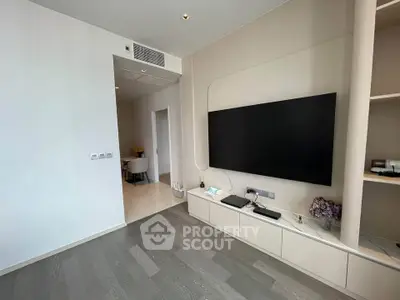 Modern living room with sleek TV setup and elegant decor