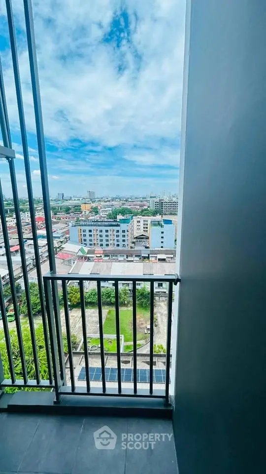 Stunning cityscape view from a high-rise balcony, perfect for urban living enthusiasts.