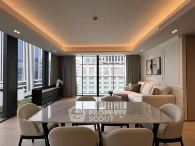 Luxurious modern living room with elegant dining area and stunning city view.