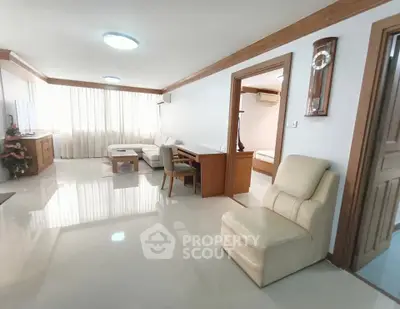 Spacious living room with modern furniture and natural light