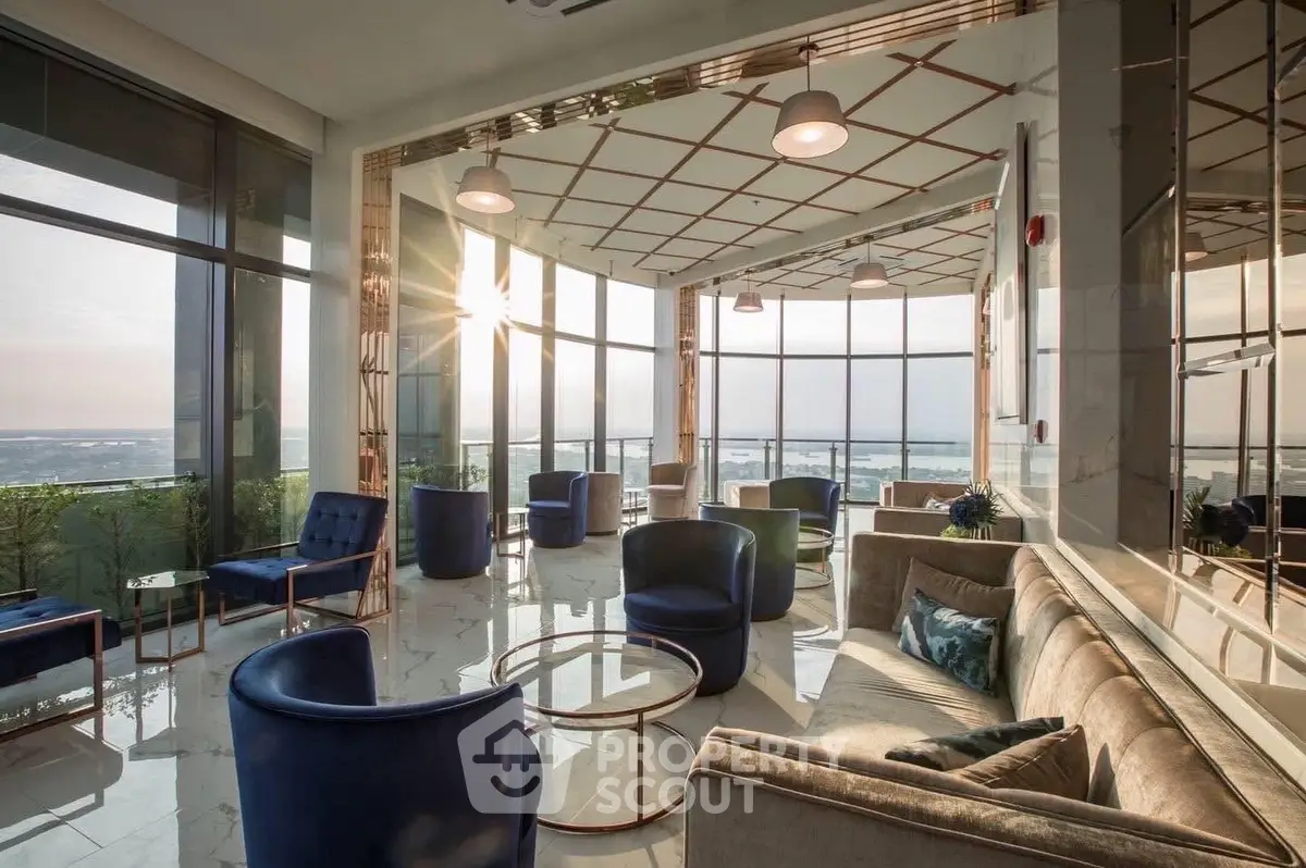 Luxurious living room with panoramic views and elegant modern furniture.