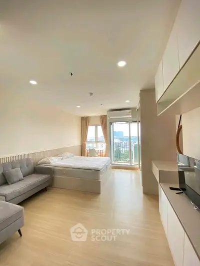 Spacious modern bedroom with city view and elegant furnishings