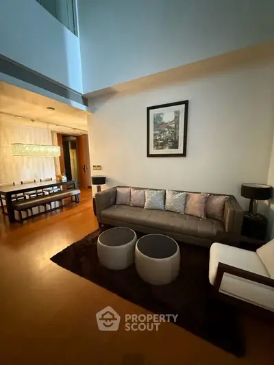 Luxurious living room with elegant dining area and modern decor